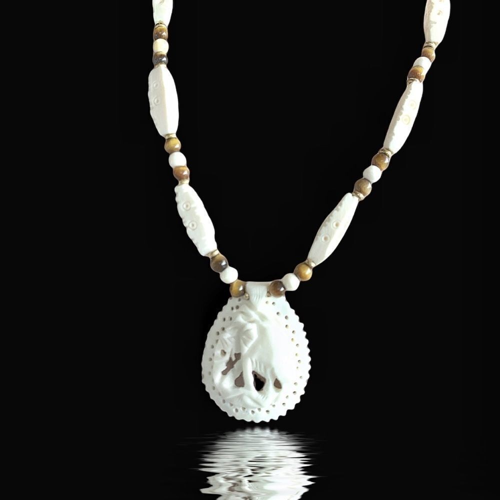 Vintage Hobe’ carved bovine natural tiger eye beads elephant pendant necklace